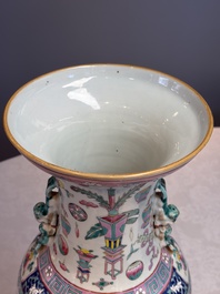 A pair of Chinese famille rose 'Antiquities' vases, 19th C.