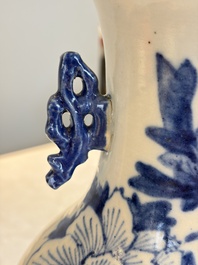 Two Chinese blue and white celadon-ground vases and a blue and white vase, on wooden stands, 19th C.