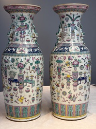 A pair of Chinese famille rose 'Antiquities' vases, 19th C.