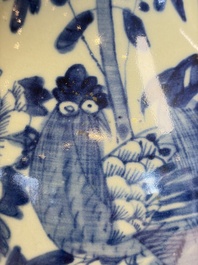 Two Chinese blue and white celadon-ground vases and a blue and white vase, on wooden stands, 19th C.