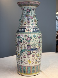 A pair of Chinese famille rose 'Antiquities' vases, 19th C.
