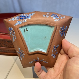 A Chinese enamelled Yixing stoneware nine-piece 'peonies' sweetmeat set on a Southeast Asian lacquer tray, 19th C.
