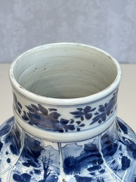 A Chinese blue and white covered vase with figures in landscapes, Kangxi