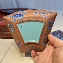 A Chinese enamelled Yixing stoneware nine-piece 'peonies' sweetmeat set on a Southeast Asian lacquer tray, 19th C.