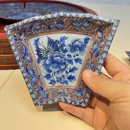A Chinese enamelled Yixing stoneware nine-piece 'peonies' sweetmeat set on a Southeast Asian lacquer tray, 19th C.