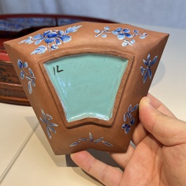 A Chinese enamelled Yixing stoneware nine-piece 'peonies' sweetmeat set on a Southeast Asian lacquer tray, 19th C.