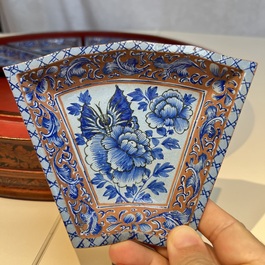 A Chinese enamelled Yixing stoneware nine-piece 'peonies' sweetmeat set on a Southeast Asian lacquer tray, 19th C.
