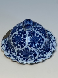 A Chinese blue and white covered vase with figures in landscapes, Kangxi