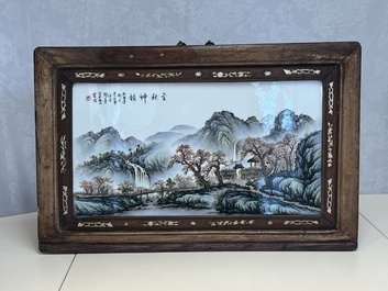 A framed Chinese famille rose 'Mountainous Landscape' plaque, after Wang Yeting 汪野亭, 20th C.