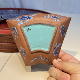 A Chinese enamelled Yixing stoneware nine-piece 'peonies' sweetmeat set on a Southeast Asian lacquer tray, 19th C.