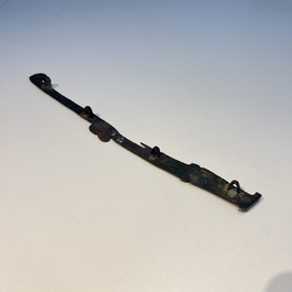 A large Chinese archaic bronze dragon-shaped fitting, early Western Zhou