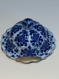 A Chinese blue and white covered vase with figures in landscapes, Kangxi