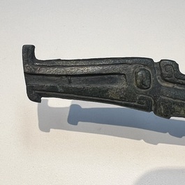 A large Chinese archaic bronze dragon-shaped fitting, early Western Zhou