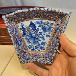 A Chinese enamelled Yixing stoneware nine-piece 'peonies' sweetmeat set on a Southeast Asian lacquer tray, 19th C.