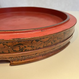 A Chinese enamelled Yixing stoneware nine-piece 'peonies' sweetmeat set on a Southeast Asian lacquer tray, 19th C.