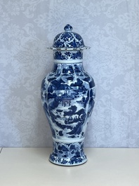 A Chinese blue and white covered vase with figures in landscapes, Kangxi