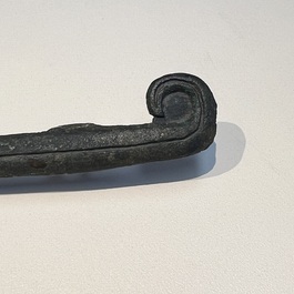 A large Chinese archaic bronze dragon-shaped fitting, early Western Zhou