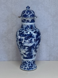 A Chinese blue and white covered vase with figures in landscapes, Kangxi