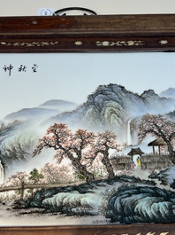 A framed Chinese famille rose 'Mountainous Landscape' plaque, after Wang Yeting 汪野亭, 20th C.