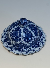 A Chinese blue and white covered vase with figures in landscapes, Kangxi