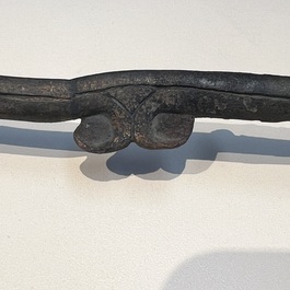 A large Chinese archaic bronze dragon-shaped fitting, early Western Zhou
