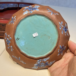 A Chinese enamelled Yixing stoneware nine-piece 'peonies' sweetmeat set on a Southeast Asian lacquer tray, 19th C.
