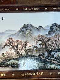 A framed Chinese famille rose 'Mountainous Landscape' plaque, after Wang Yeting 汪野亭, 20th C.