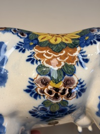 A pair of polychrome Dutch Delft cows, 18th C.