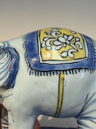 A pair of blue, white and yellow Frankfurt faience models of elephants, ca. 1700