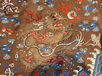 A Chinese brown-ground embroidered silk 'Dragon' robe, 'Ji Fu' 吉服, 19th C.