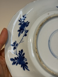 Four Chinese blue and white moulded plates with floral design, Kangxi