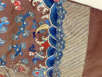 A Chinese brown-ground embroidered silk 'Dragon' robe, 'Ji Fu' 吉服, 19th C.