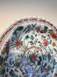 Three sets of Chinese famille verte cups and saucers with birds and flowers, various marks, Kangxi