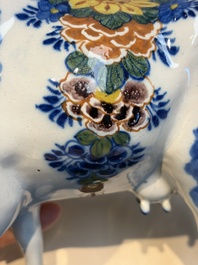 A pair of polychrome Dutch Delft cows, 18th C.