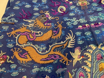 A Chinese blue-ground embroidered silk 'Dragon' robe, 'Ji Fu' 吉服, 19th C.