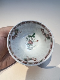 Three sets of Chinese famille verte cups and saucers with birds and flowers, various marks, Kangxi