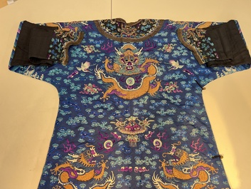 A Chinese blue-ground embroidered silk 'Dragon' robe, 'Ji Fu' 吉服, 19th C.