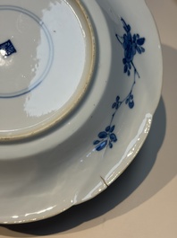 Four Chinese blue and white moulded plates with floral design, Kangxi