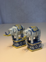 A pair of blue, white and yellow Frankfurt faience models of elephants, ca. 1700