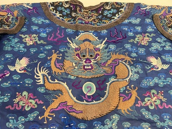 A Chinese blue-ground embroidered silk 'Dragon' robe, 'Ji Fu' 吉服, 19th C.