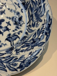 Four Chinese blue and white moulded plates with floral design, Kangxi
