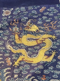 A Chinese blue-ground embroidered silk summer gauze 'Dragon' robe, 'Ji Fu' 吉服, 19th C.