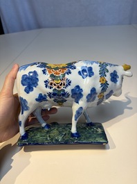 A pair of polychrome Dutch Delft cows, 18th C.