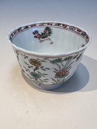 Three sets of Chinese famille verte cups and saucers with birds and flowers, various marks, Kangxi