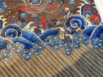 A Chinese brown-ground embroidered silk 'Dragon' robe, 'Ji Fu' 吉服, 19th C.
