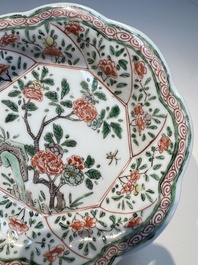 Three sets of Chinese famille verte cups and saucers with birds and flowers, various marks, Kangxi