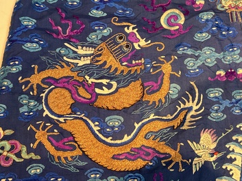 A Chinese blue-ground embroidered silk 'Dragon' robe, 'Ji Fu' 吉服, 19th C.