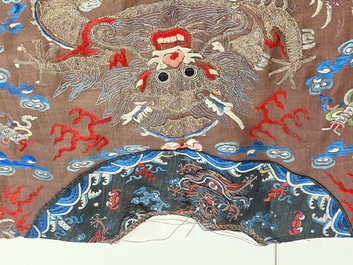A Chinese brown-ground embroidered silk 'Dragon' robe, 'Ji Fu' 吉服, 19th C.