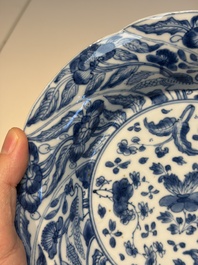 Four Chinese blue and white moulded plates with floral design, Kangxi