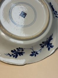 Four Chinese blue and white moulded plates with floral design, Kangxi